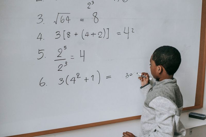 Tutor guiding a student through a physics problem